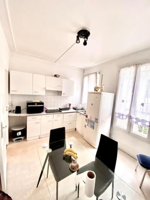 Balcon De Paris Apartment แฌเนอวีลิเยร์ ภายนอก รูปภาพ