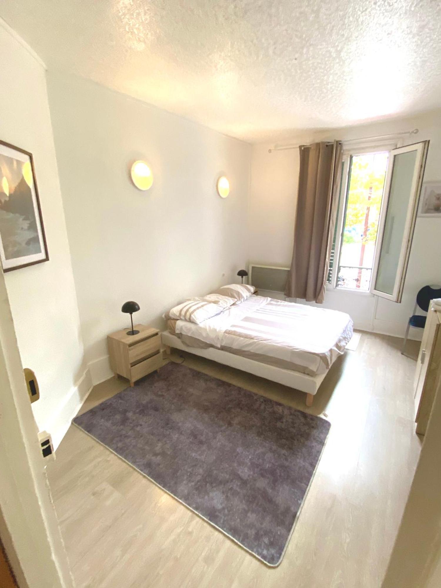 Balcon De Paris Apartment แฌเนอวีลิเยร์ ภายนอก รูปภาพ
