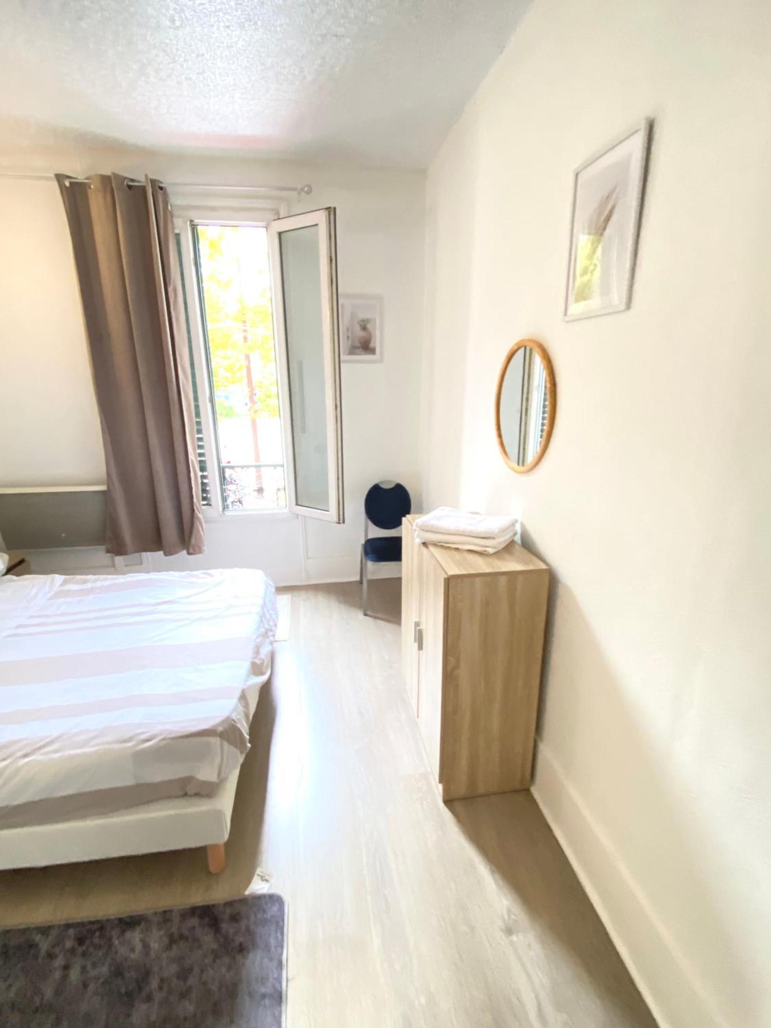 Balcon De Paris Apartment แฌเนอวีลิเยร์ ภายนอก รูปภาพ